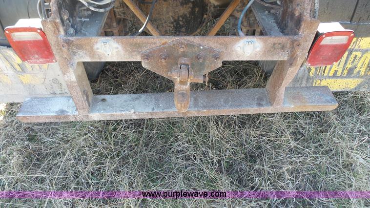 image for item L3693 2004 Sterling Acterra roll off container truck