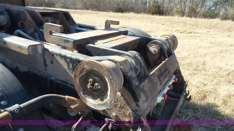 image for item L3693 2004 Sterling Acterra roll off container truck