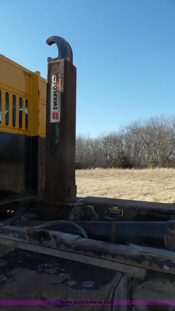 image for item L3693 2004 Sterling Acterra roll off container truck