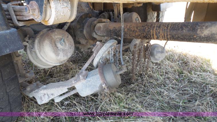 image for item L3693 2004 Sterling Acterra roll off container truck