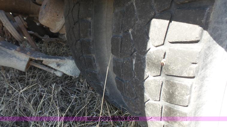 image for item L3693 2004 Sterling Acterra roll off container truck