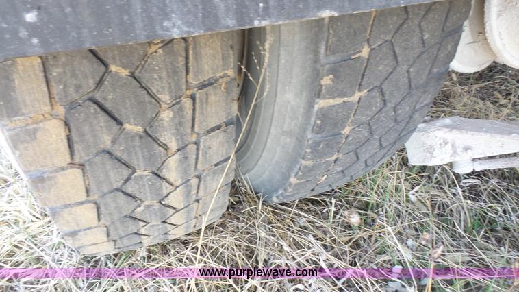 image for item L3693 2004 Sterling Acterra roll off container truck