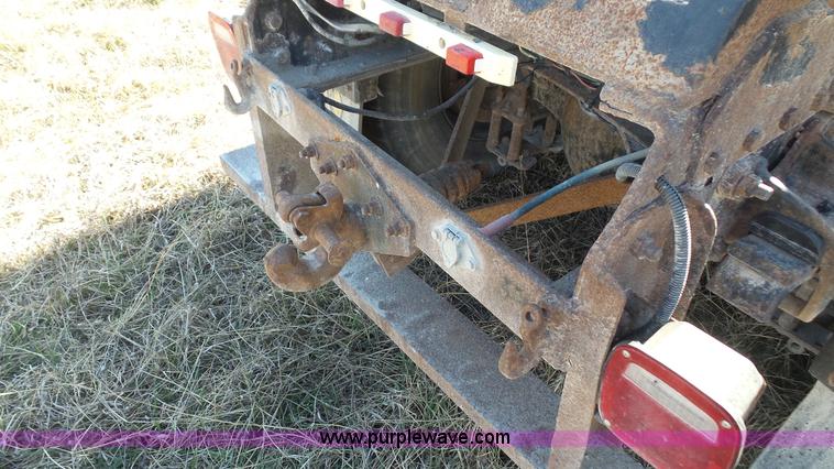 image for item L3693 2004 Sterling Acterra roll off container truck