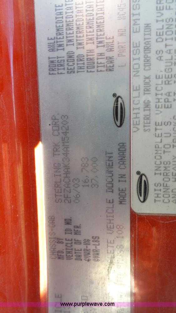 image for item L3693 2004 Sterling Acterra roll off container truck