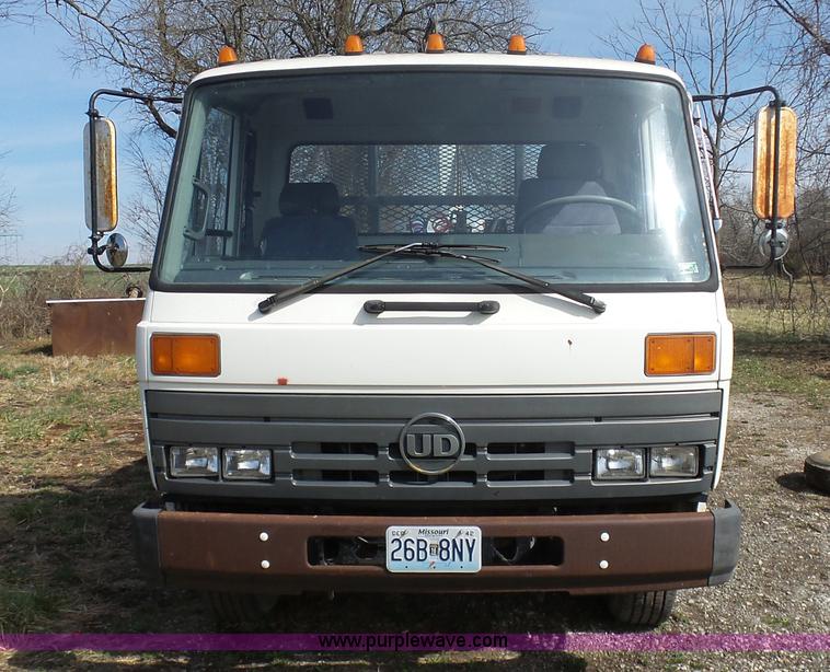 image for item BH9371 1992 Nissan truck and Landoll trailer