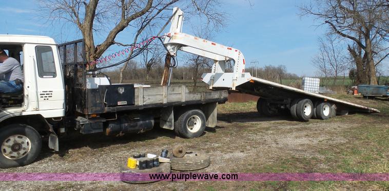 image for item BH9371 1992 Nissan truck and Landoll trailer