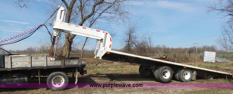 image for item BH9371 1992 Nissan truck and Landoll trailer