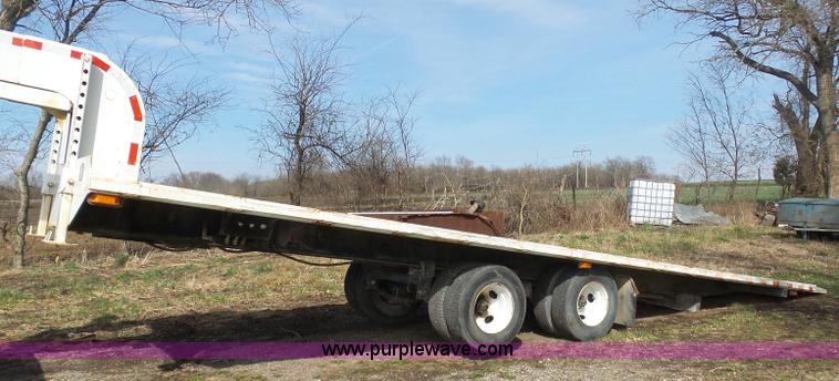 image for item BH9371 1992 Nissan truck and Landoll trailer