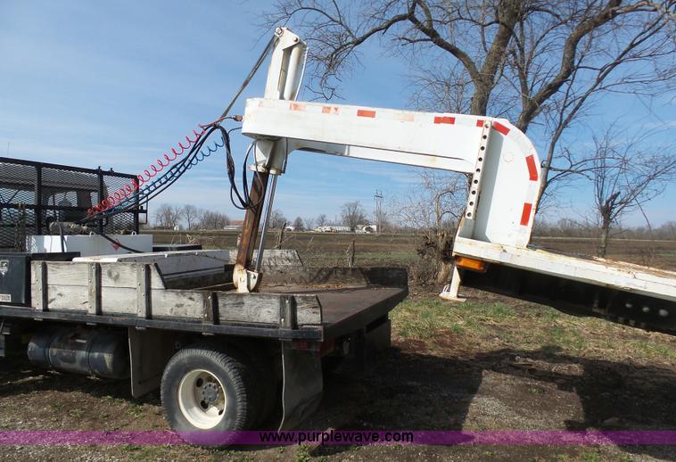 image for item BH9371 1992 Nissan truck and Landoll trailer