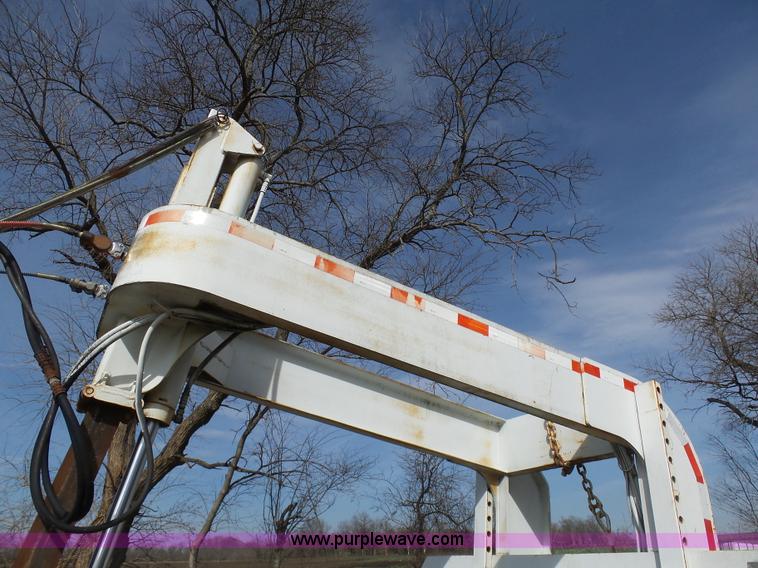 image for item BH9371 1992 Nissan truck and Landoll trailer