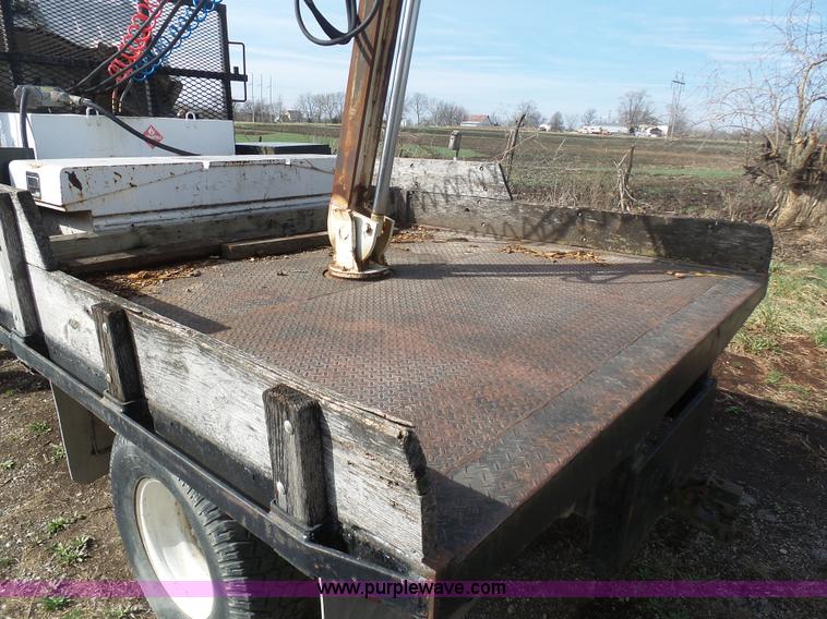 image for item BH9371 1992 Nissan truck and Landoll trailer