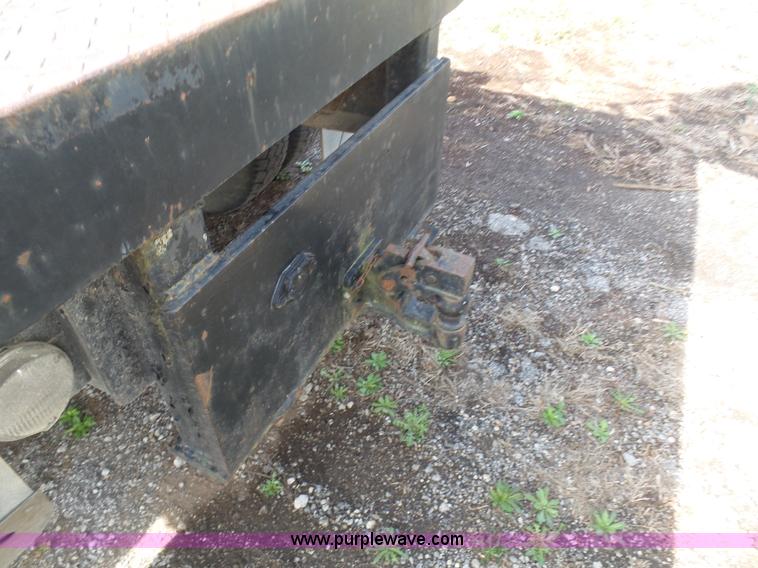 image for item BH9371 1992 Nissan truck and Landoll trailer