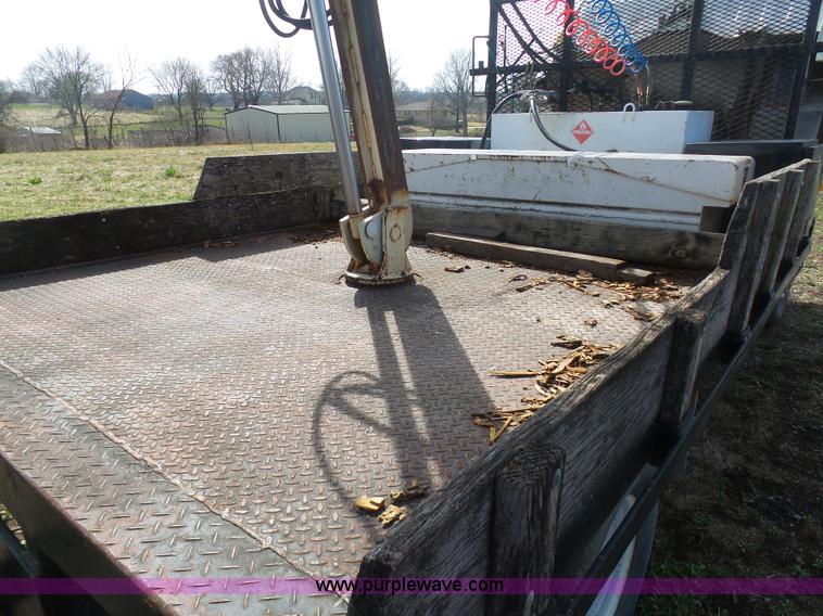 image for item BH9371 1992 Nissan truck and Landoll trailer