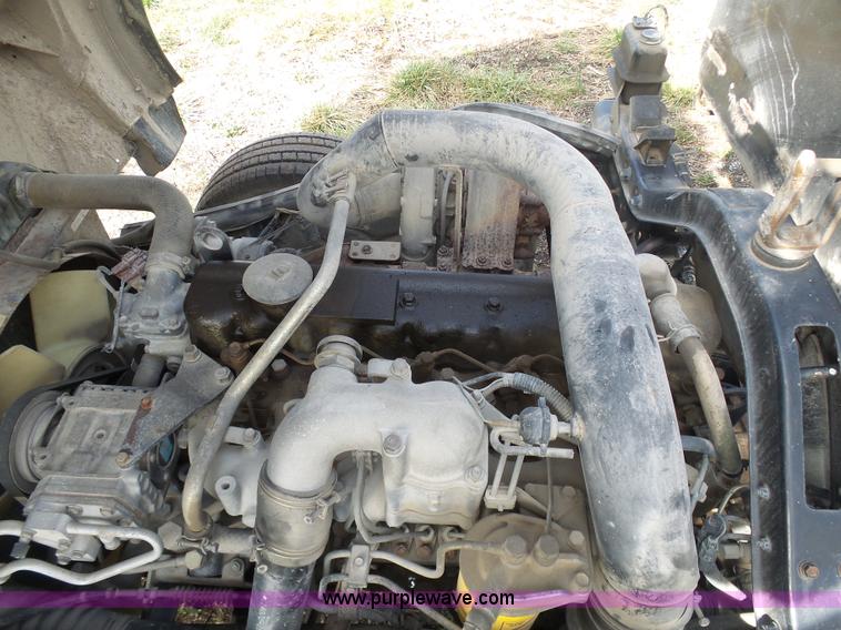 image for item BH9371 1992 Nissan truck and Landoll trailer