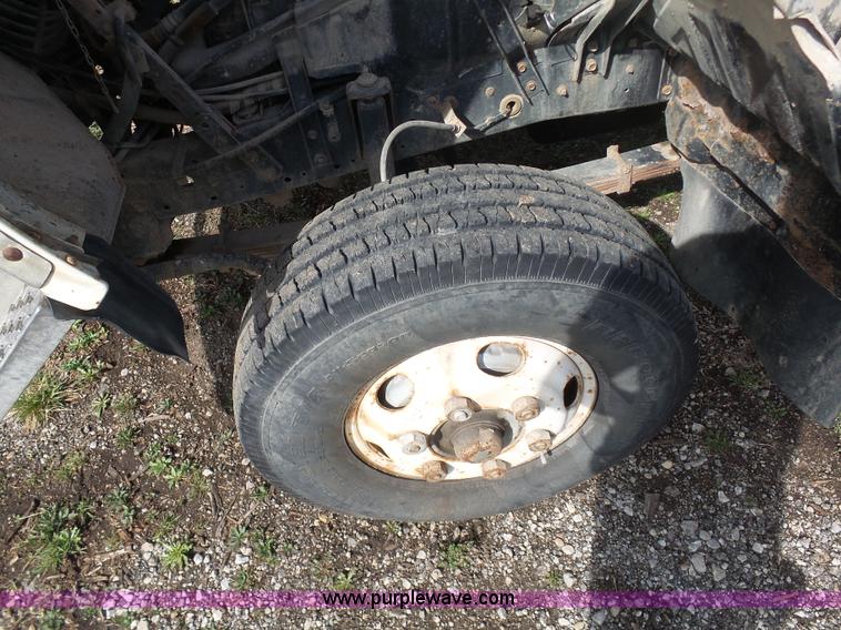 image for item BH9371 1992 Nissan truck and Landoll trailer