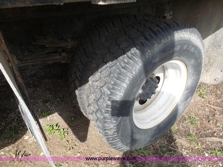 image for item BH9371 1992 Nissan truck and Landoll trailer