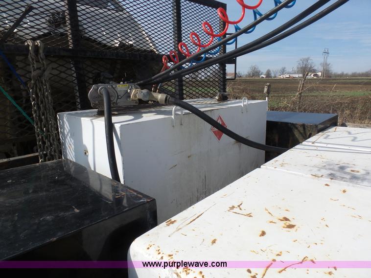 image for item BH9371 1992 Nissan truck and Landoll trailer