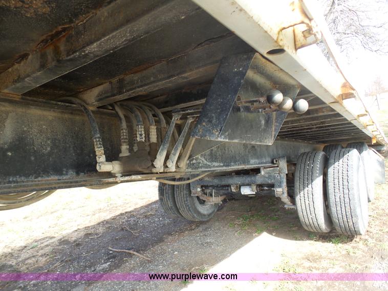 image for item BH9371 1992 Nissan truck and Landoll trailer