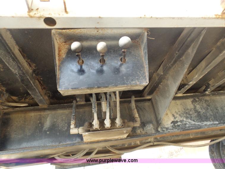 image for item BH9371 1992 Nissan truck and Landoll trailer