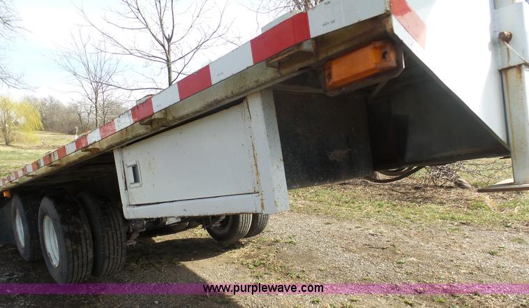 image for item BH9371 1992 Nissan truck and Landoll trailer