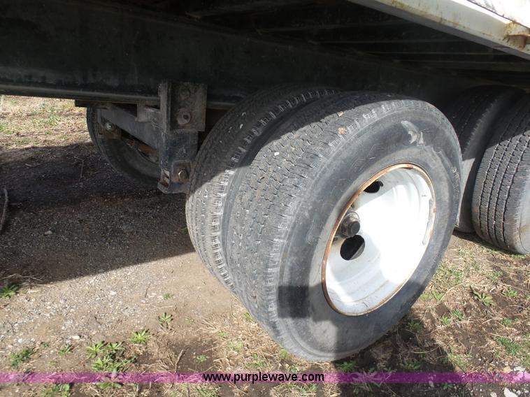 image for item BH9371 1992 Nissan truck and Landoll trailer