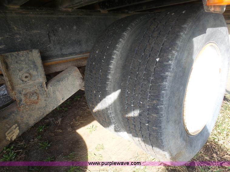 image for item BH9371 1992 Nissan truck and Landoll trailer