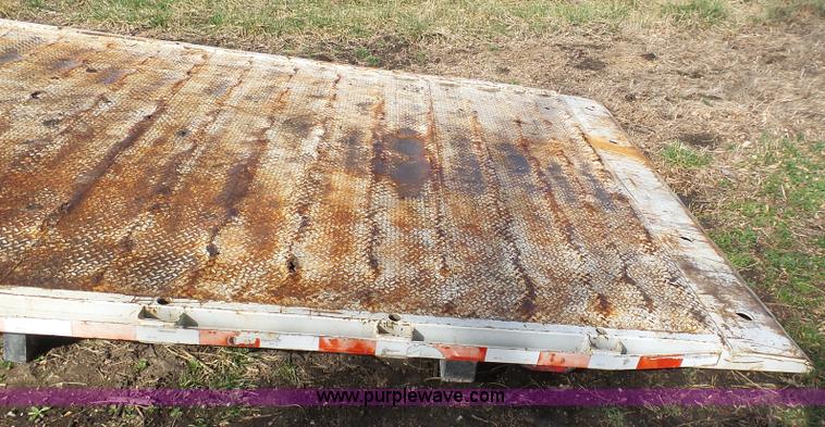 image for item BH9371 1992 Nissan truck and Landoll trailer