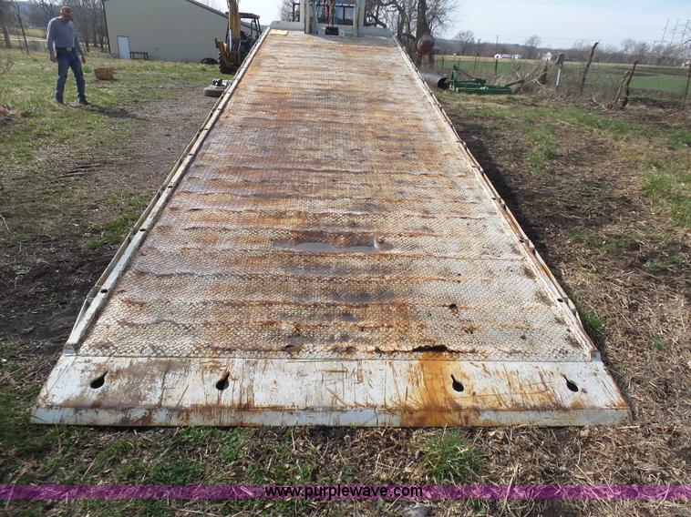 image for item BH9371 1992 Nissan truck and Landoll trailer