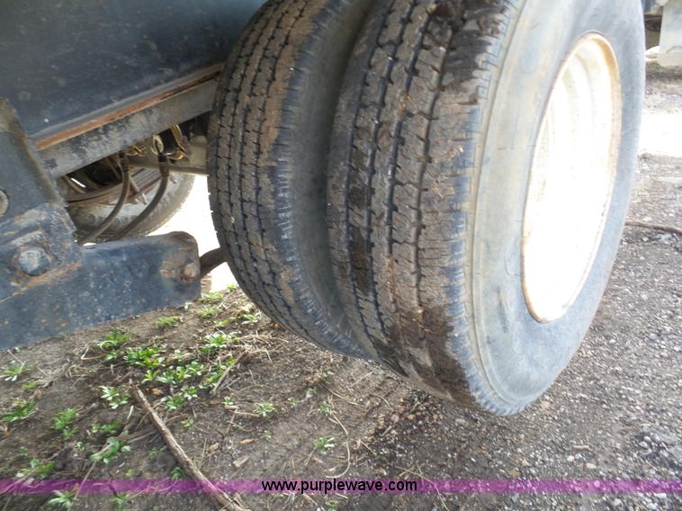 image for item BH9371 1992 Nissan truck and Landoll trailer