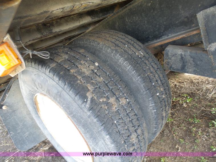 image for item BH9371 1992 Nissan truck and Landoll trailer