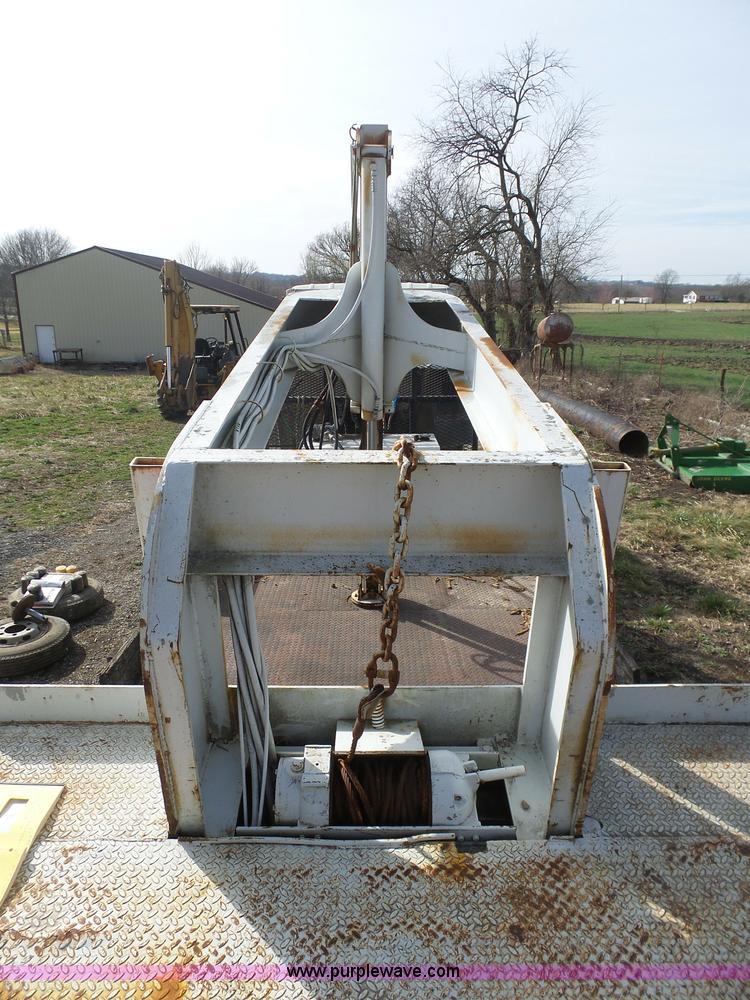 image for item BH9371 1992 Nissan truck and Landoll trailer