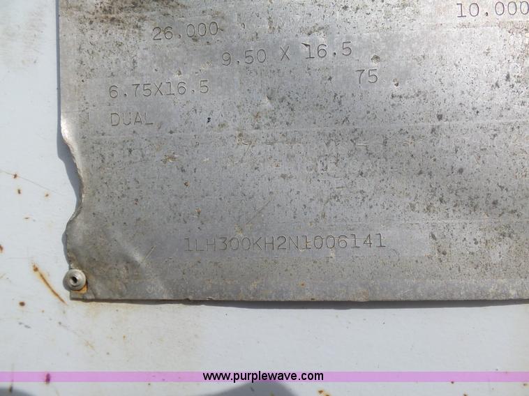 image for item BH9371 1992 Nissan truck and Landoll trailer