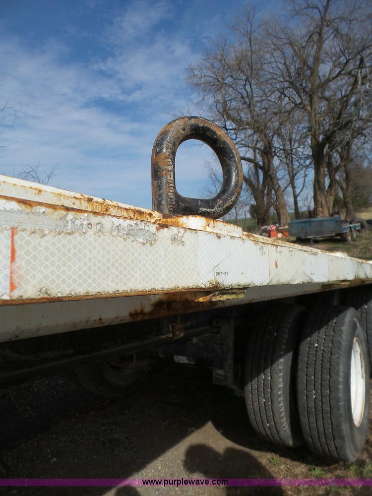 image for item BH9371 1992 Nissan truck and Landoll trailer