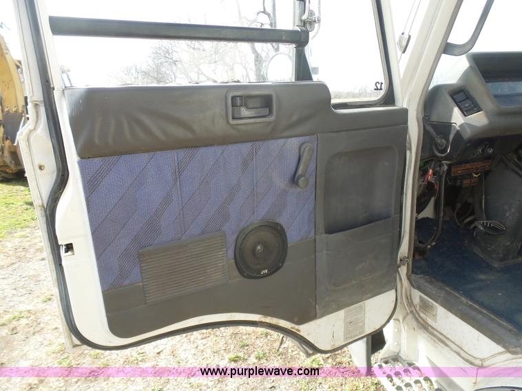 image for item BH9371 1992 Nissan truck and Landoll trailer