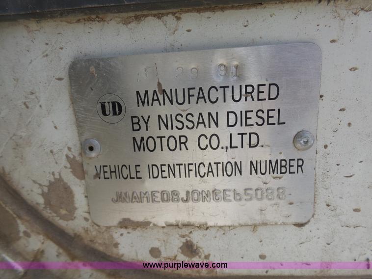 image for item BH9371 1992 Nissan truck and Landoll trailer