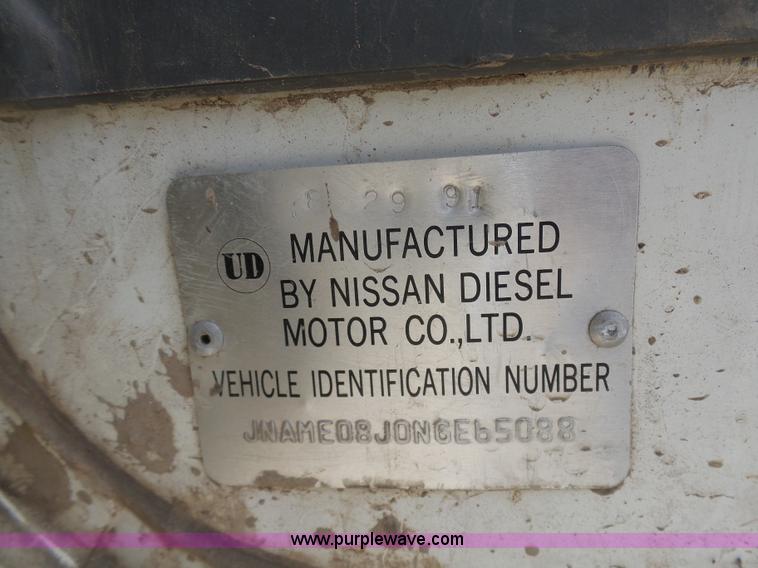 image for item BH9371 1992 Nissan truck and Landoll trailer