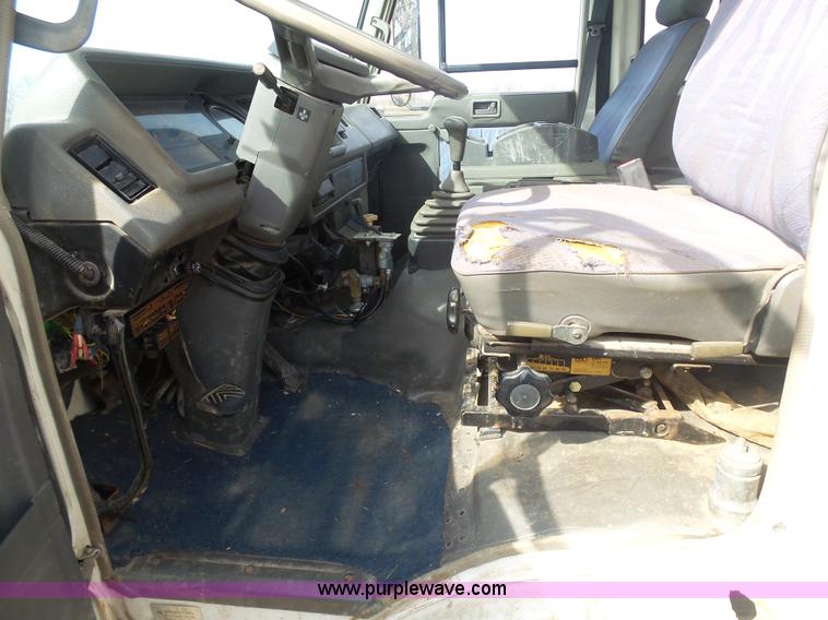 image for item BH9371 1992 Nissan truck and Landoll trailer