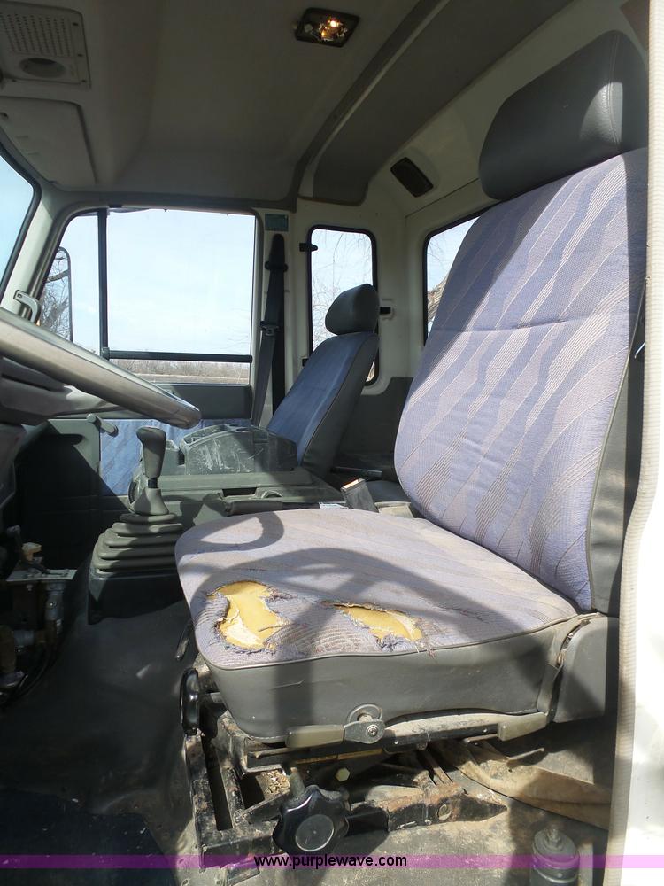 image for item BH9371 1992 Nissan truck and Landoll trailer