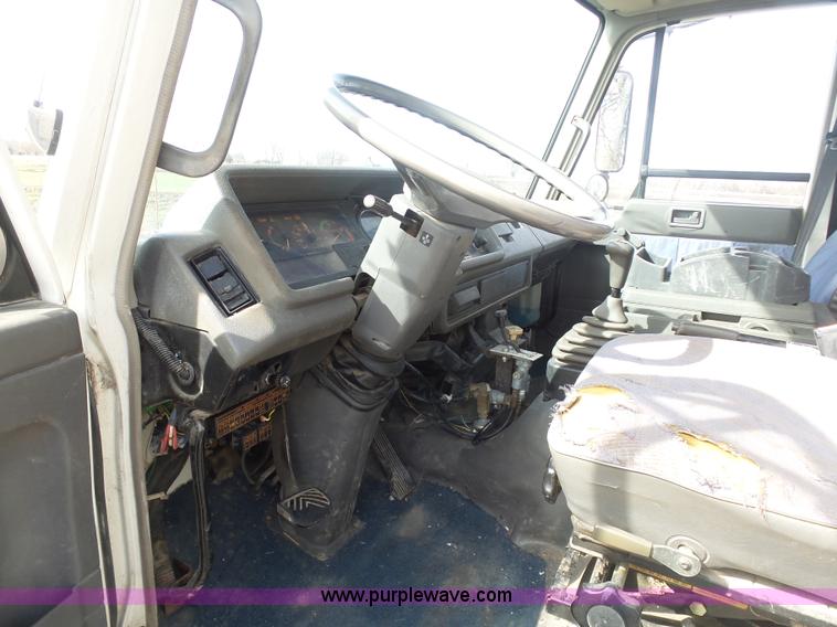 image for item BH9371 1992 Nissan truck and Landoll trailer