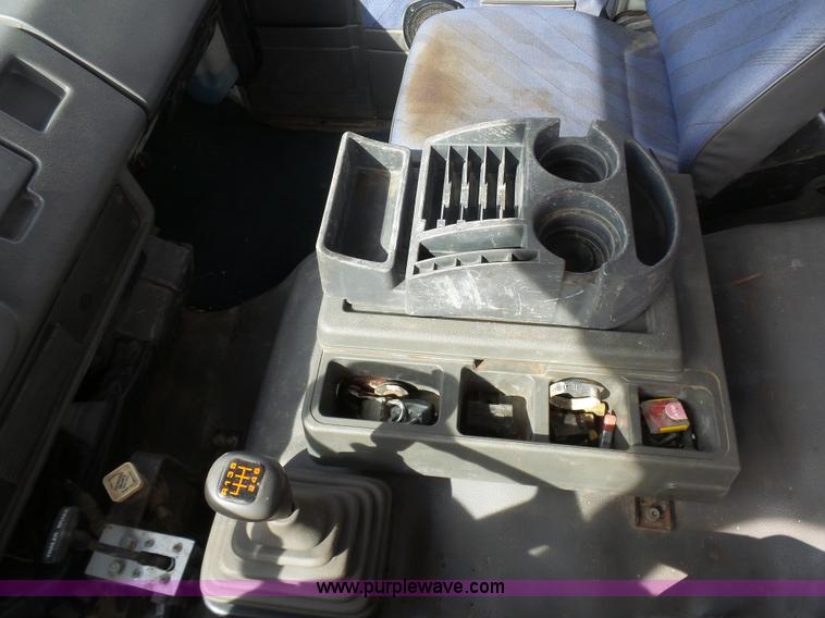 image for item BH9371 1992 Nissan truck and Landoll trailer