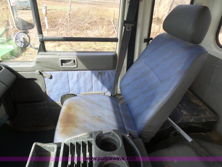 image for item BH9371 1992 Nissan truck and Landoll trailer