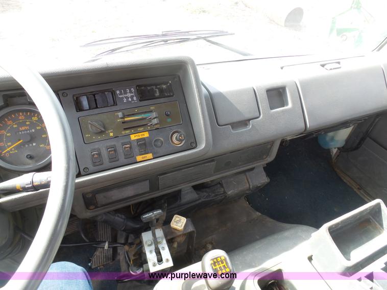 image for item BH9371 1992 Nissan truck and Landoll trailer