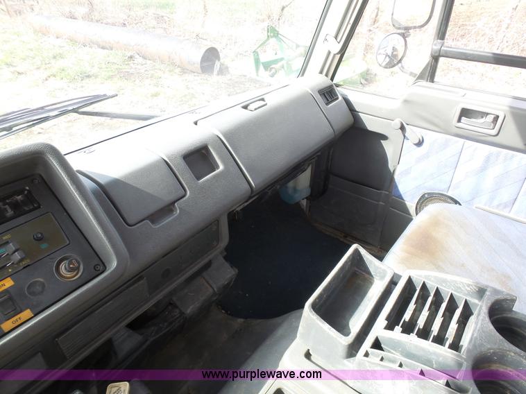 image for item BH9371 1992 Nissan truck and Landoll trailer