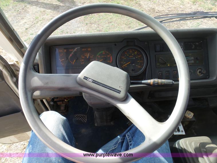 image for item BH9371 1992 Nissan truck and Landoll trailer