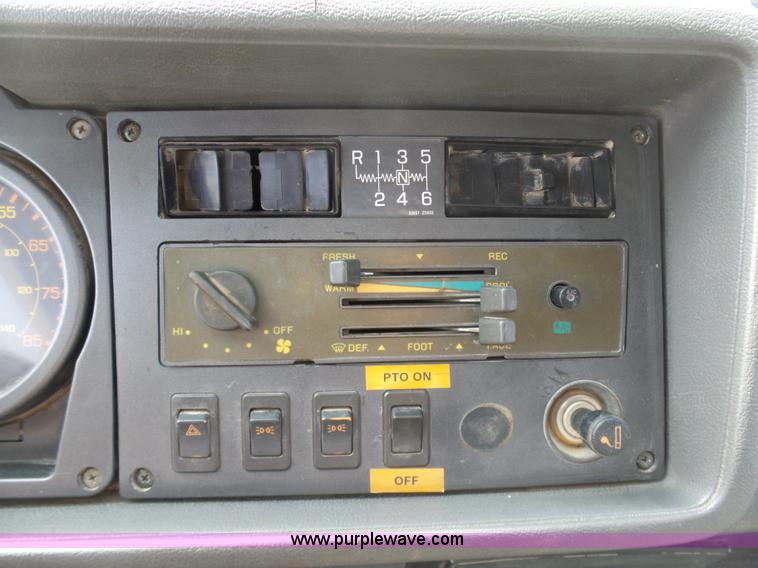 image for item BH9371 1992 Nissan truck and Landoll trailer