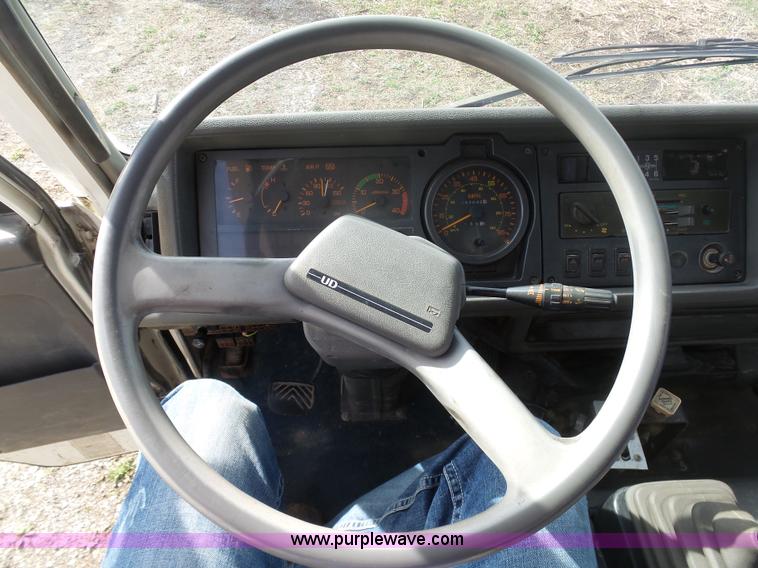 image for item BH9371 1992 Nissan truck and Landoll trailer