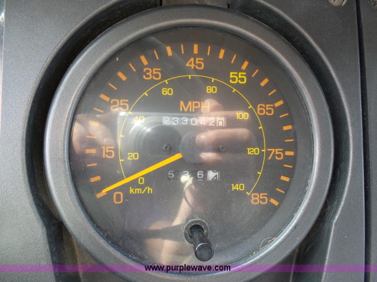 image for item BH9371 1992 Nissan truck and Landoll trailer