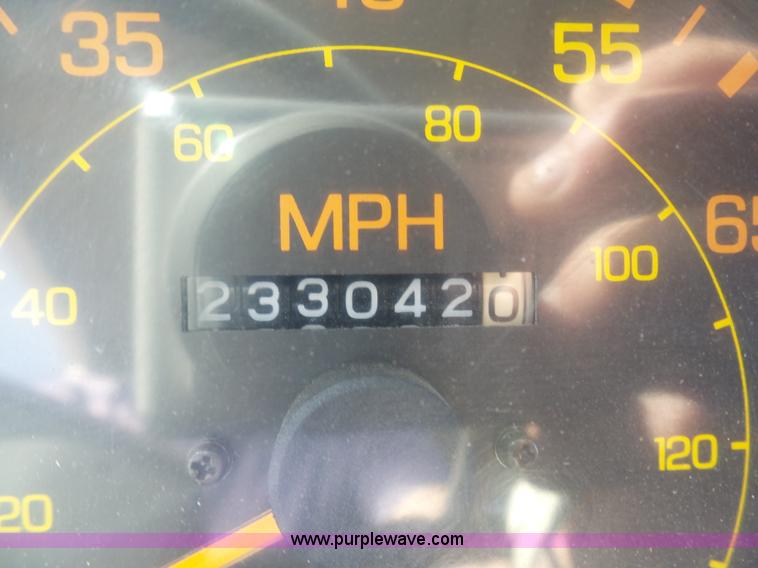 image for item BH9371 1992 Nissan truck and Landoll trailer