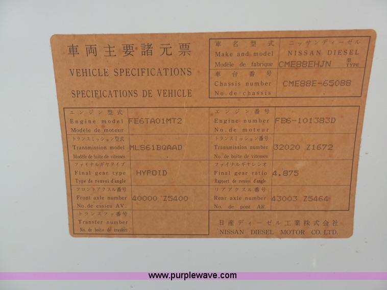 image for item BH9371 1992 Nissan truck and Landoll trailer