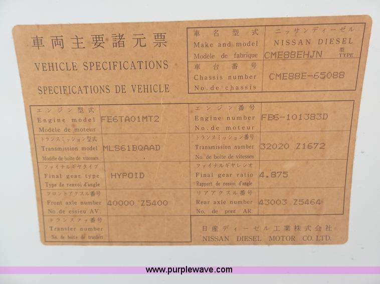 image for item BH9371 1992 Nissan truck and Landoll trailer